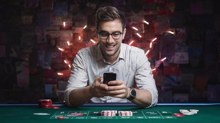 Antarmuka aplikasi mobile betting sites menampilkan live-dealer kasino dan permainan slot